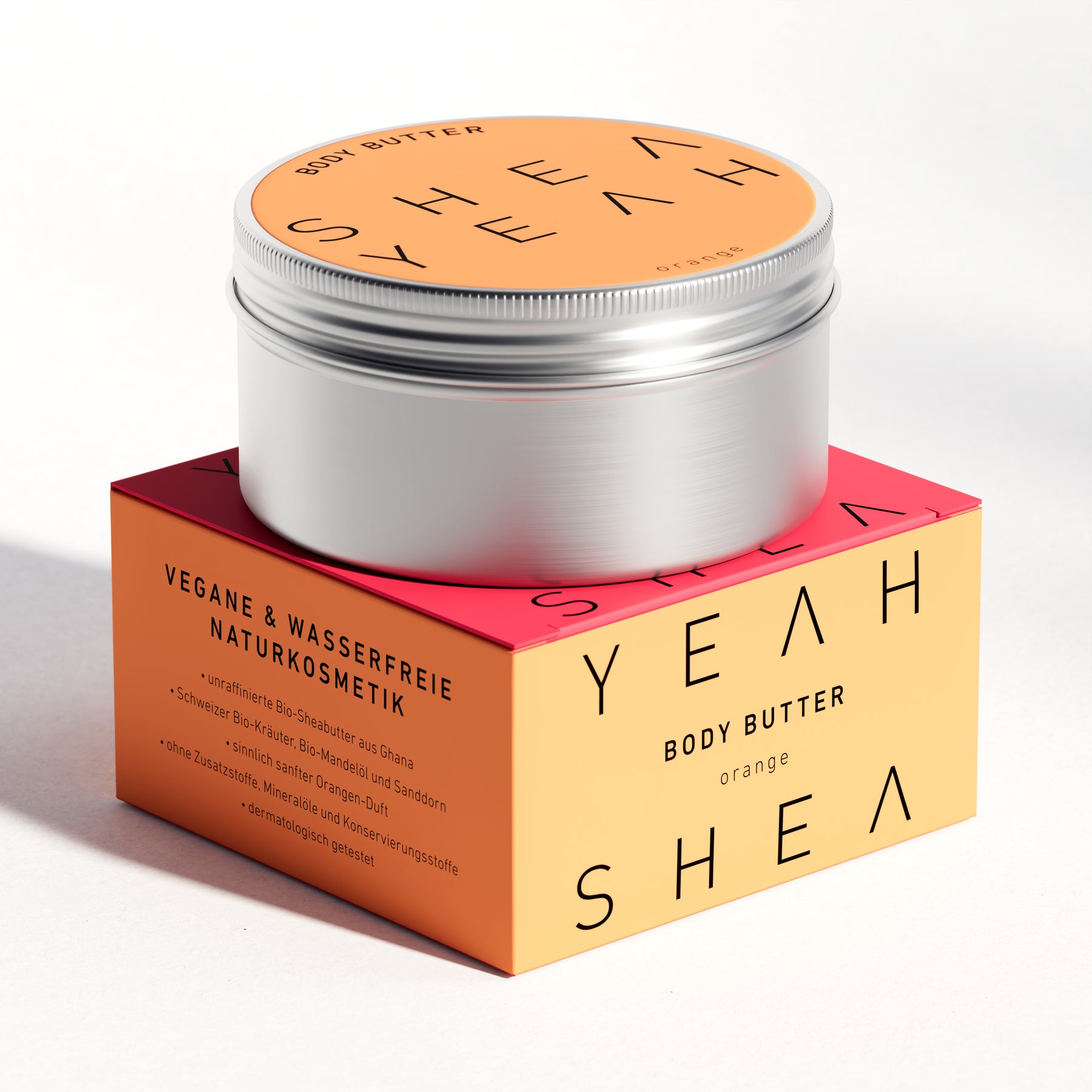 Shea Yeah Body Butter mit Orangenduft, Dose auf der Schachtel, Naturkosmetik mit Sheabutter.