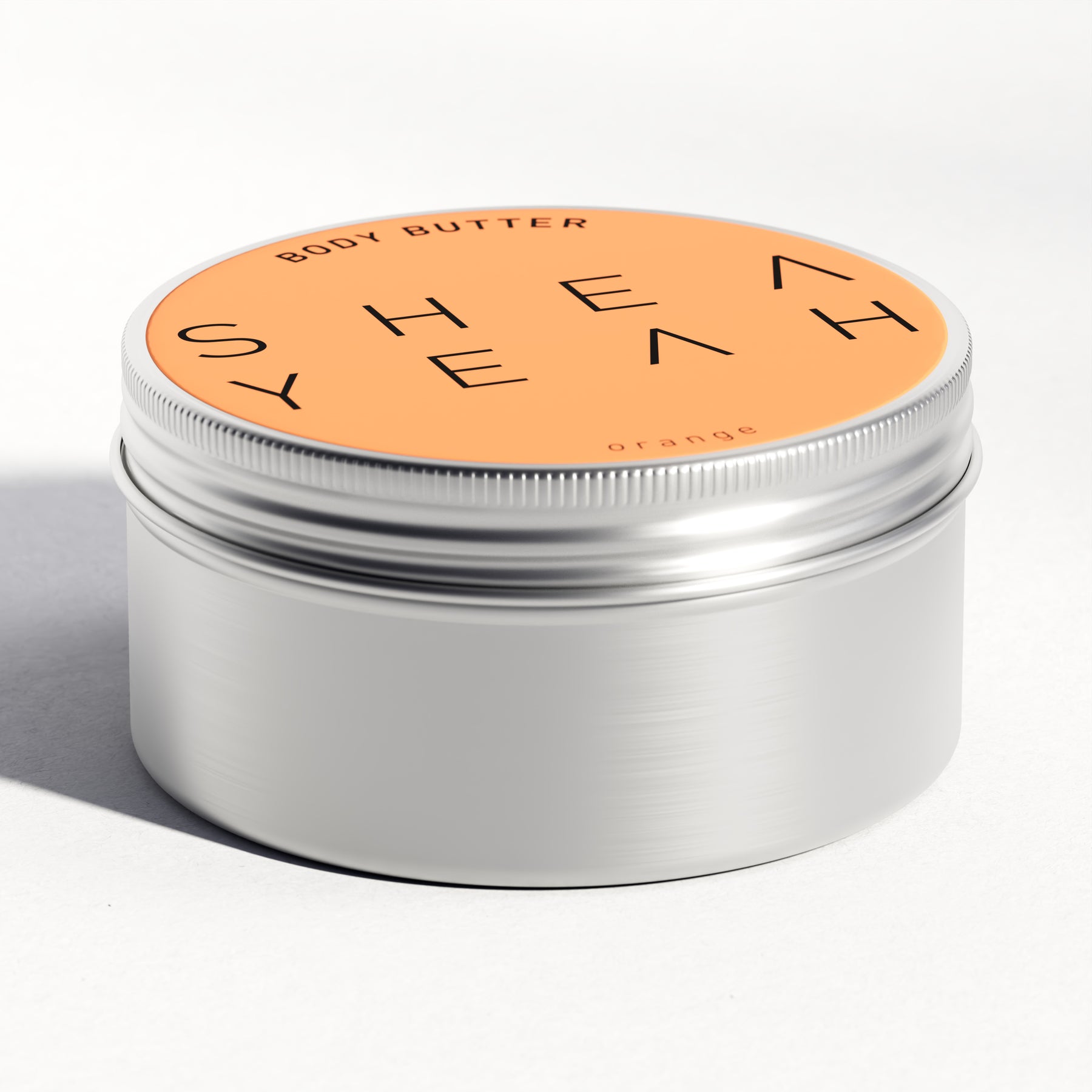Shea Yeah Body Butter mit Orangenduft in der geschlossenen Dose, Naturkosmetik mit Sheabutter.